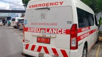 Foto;Mobil Ambulance Milik RSUD Sidikalang HIACE COMMUTER Yang Sedang Parkir di Area RSUD Sidikalang Yang Menggunakan Plat Merah Yang Sama Dengan Mobil Ambulance Jenis Ford Renger,Yaitu Dengan Nomor Plat BB 8081 Y